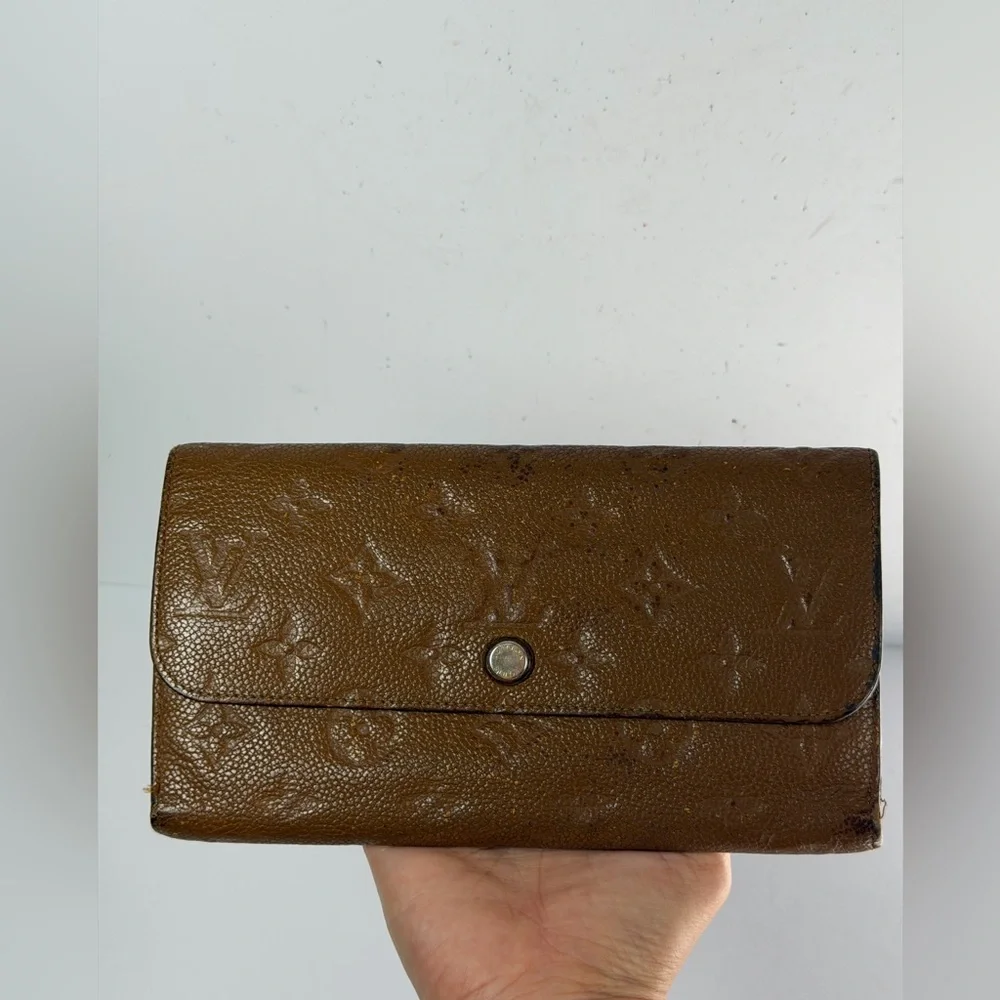 Louis Vuitton Virtuose Wallet Crafted Brown Monogram Empreinte Leather